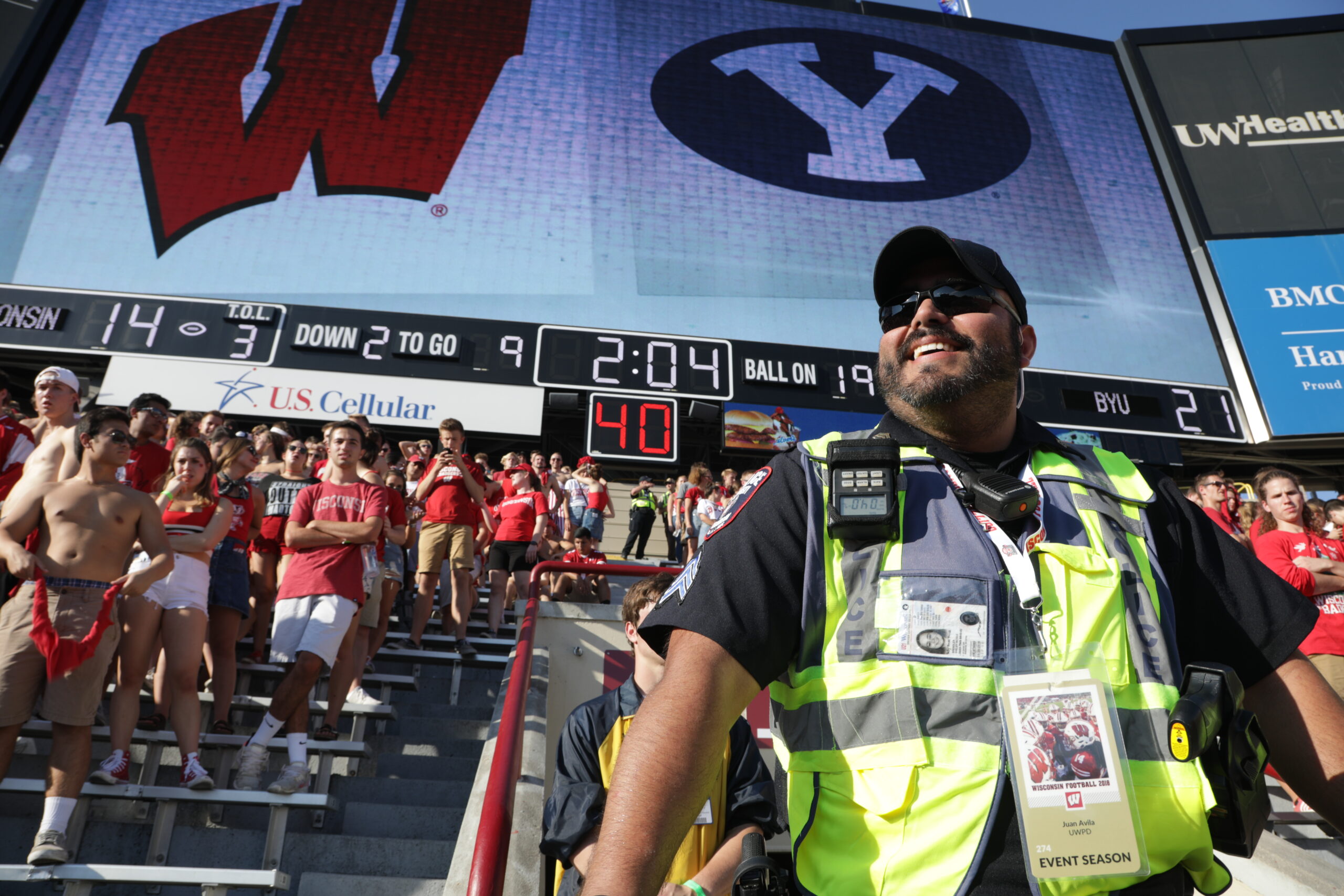 A photo of Sgt. Juan Avila providing security at a UW football game.