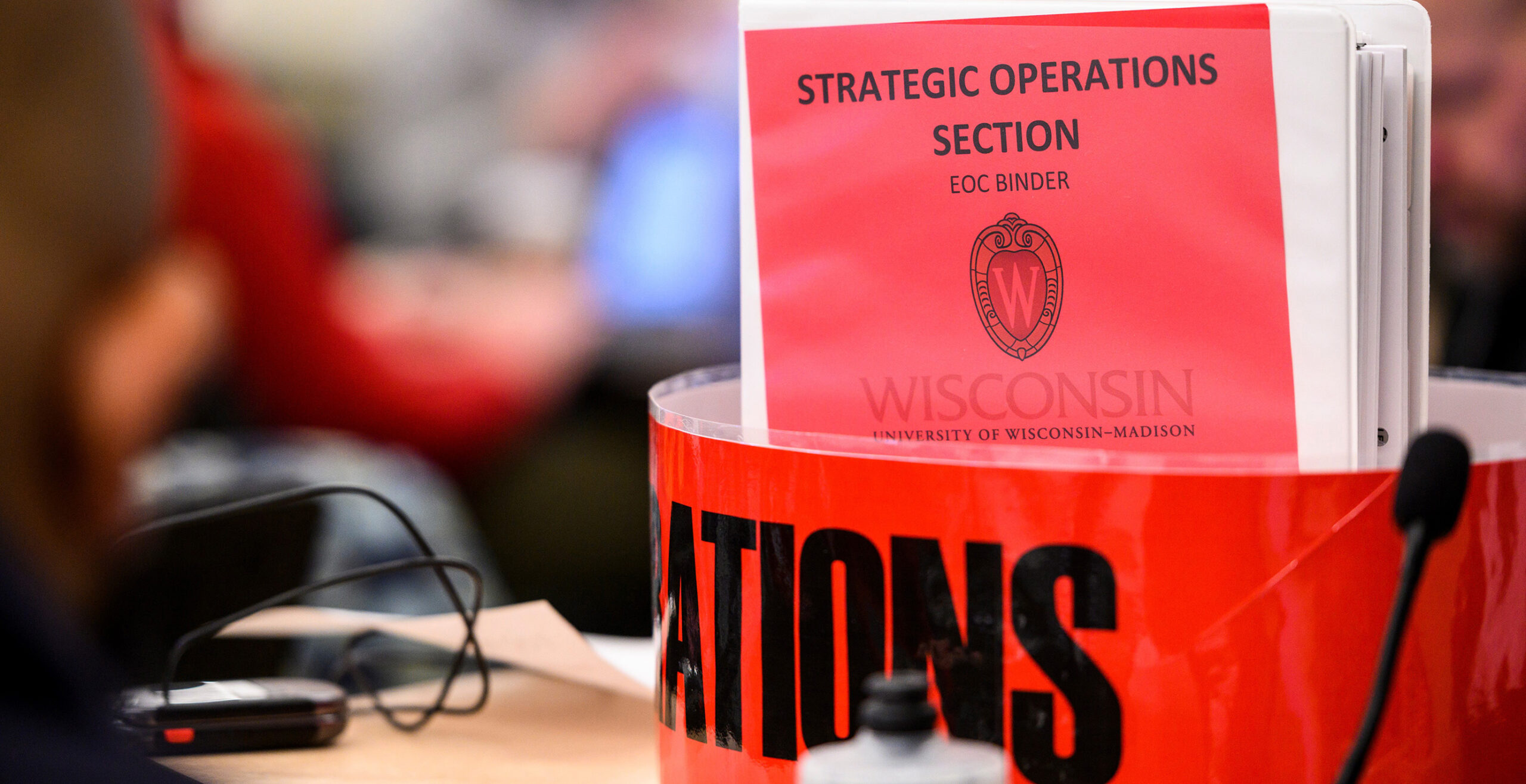 UW-Madison staff working in an Emergency Operation Center (EOC) at the University of Wisconsin-Madison triage the impact of and UW-Madison campus response to the rapidly-evolving health concerns of the global coronavirus (COVID-19) pandemic.