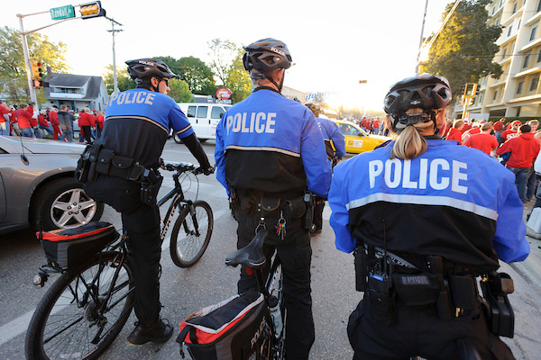 Police on bikes patrol during the Nebraska football game at UW.