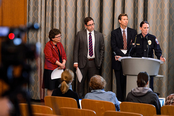 As part of a campus emergency-response exercise, UW Police Department Chief Kristen Roman speaks during a mock press conference, accompanied by Chancellor Rebecca Blank, Laurent Heller and Charles Hoslet.