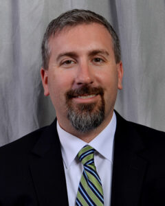 Headshot of Jason Whitney