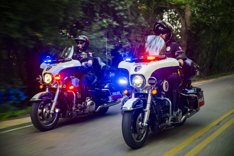 uwpd motorcycles driving on road