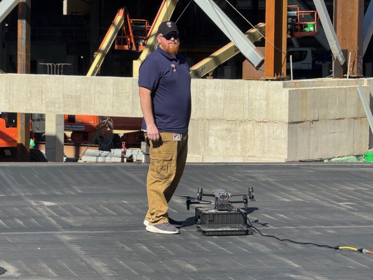 UWPD Drone Team Member assisting with a drone launch